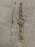 Gold women’s watch &bracelet set
